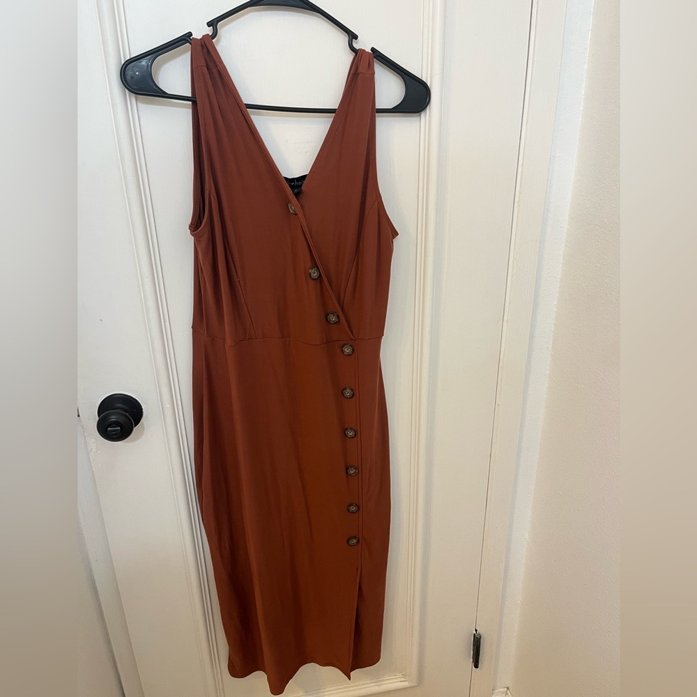Burnt orange colored dress with buttons size L